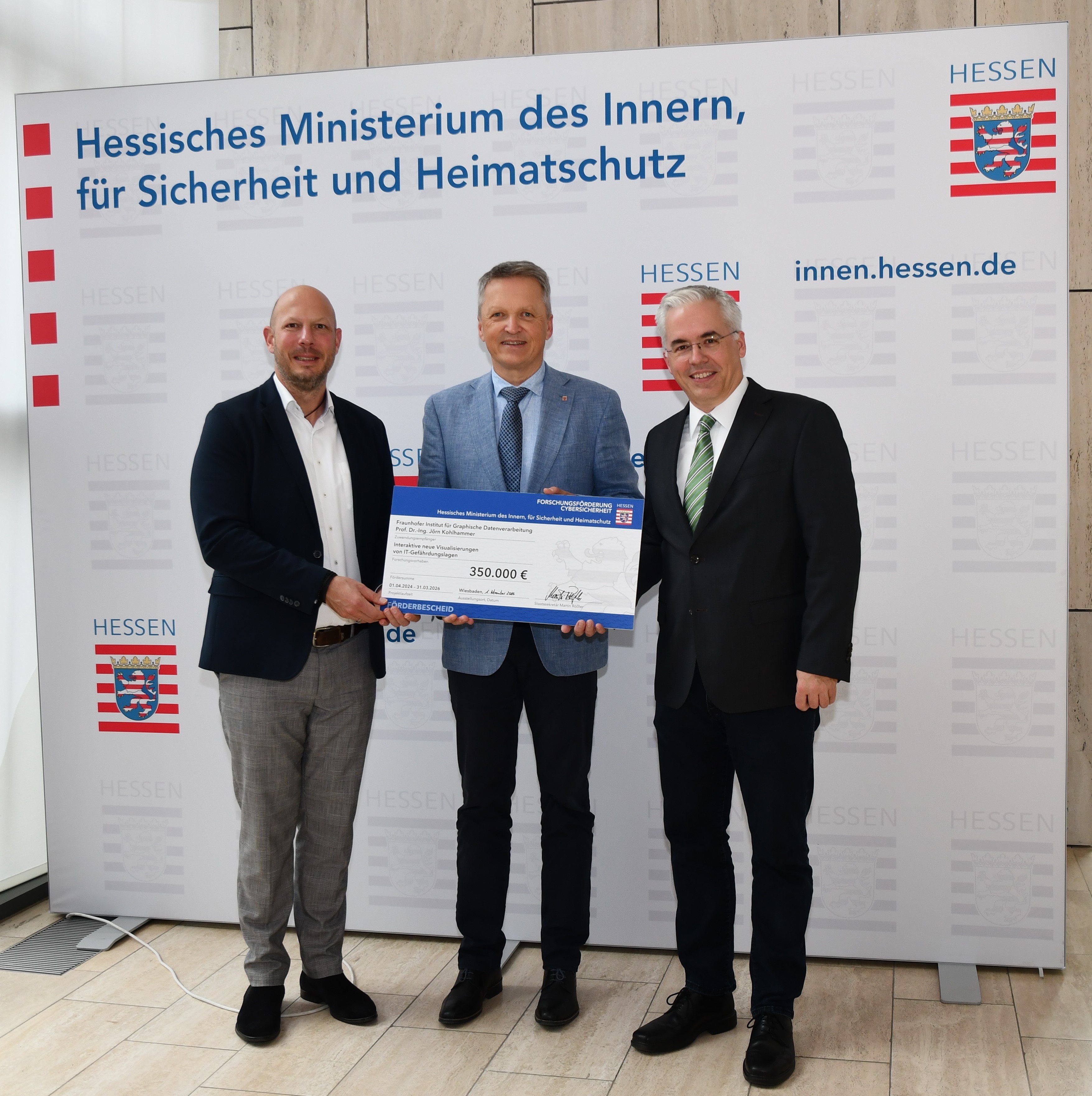 Bastian Schäfer; Staatssekretär Martin Rößler; und Jörn Kohlhammer.
