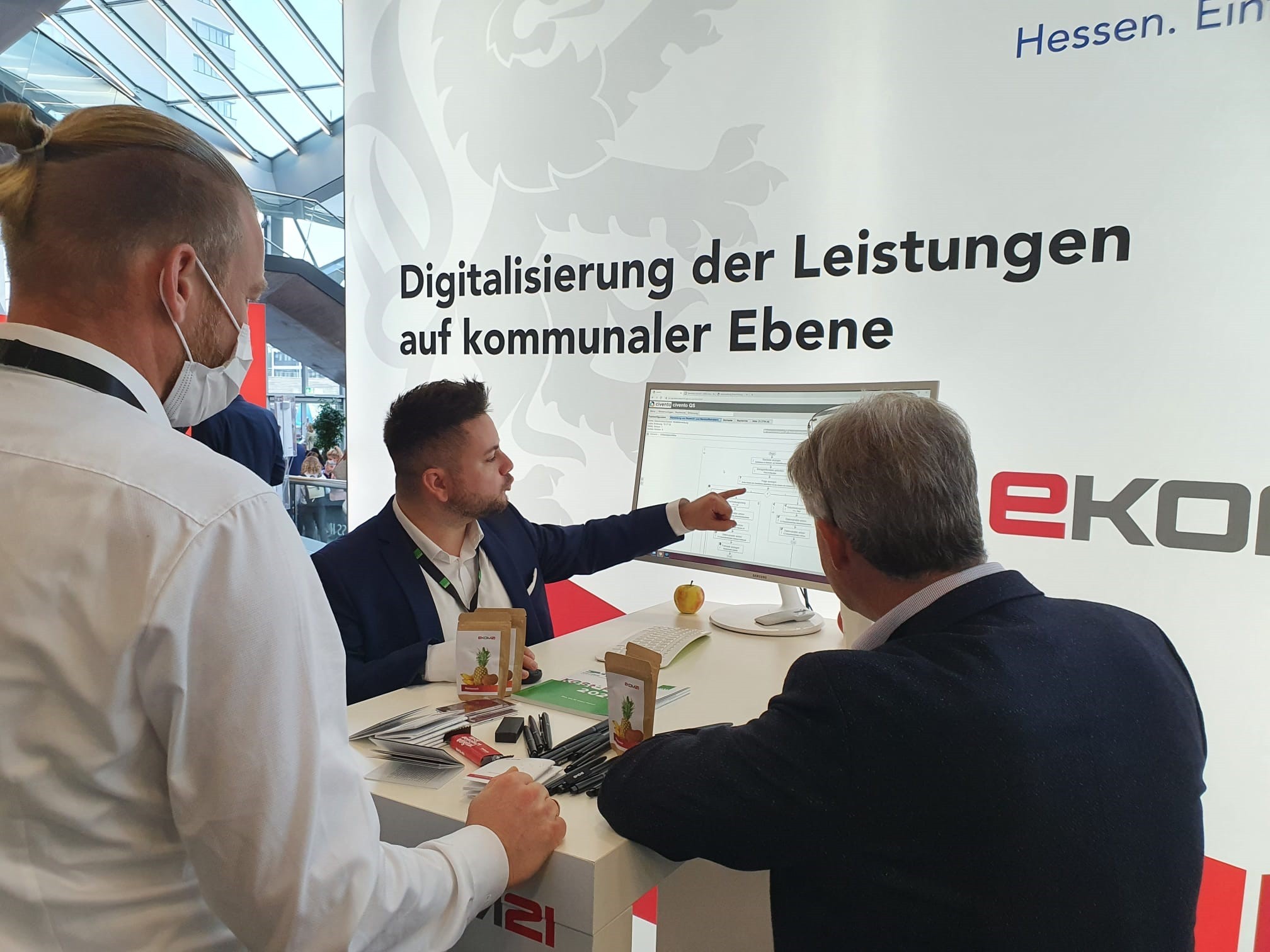 Drei Personen während des KGST-Forums.